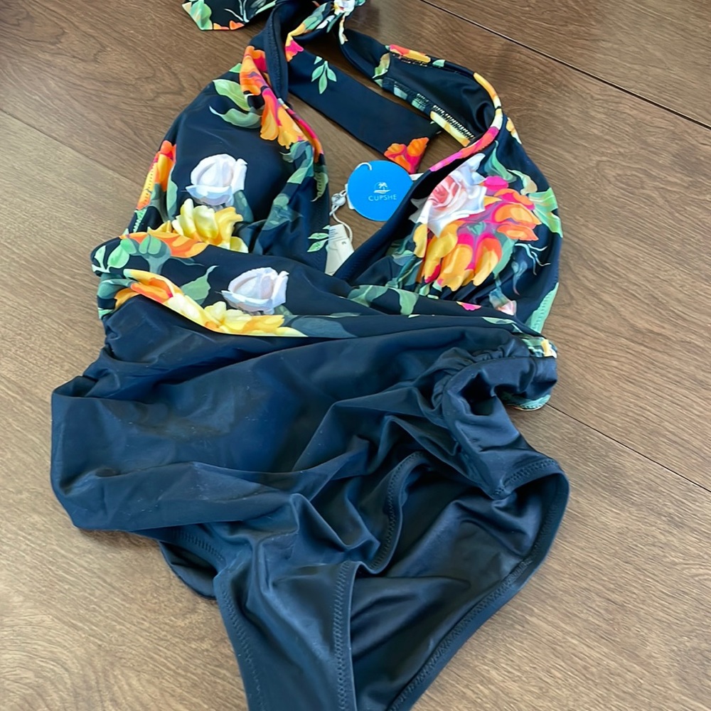 Cupshe. Deep plunge, backless one piece with ruched bottom. NWT. Never worn.